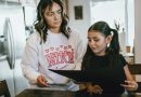 A mother and daughter together, representing a difficult family conversation about an apartment lease.