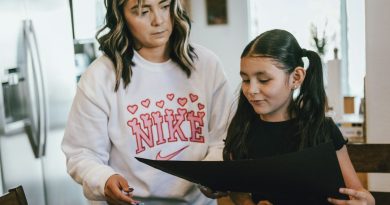 A mother and daughter together, representing a difficult family conversation about an apartment lease.