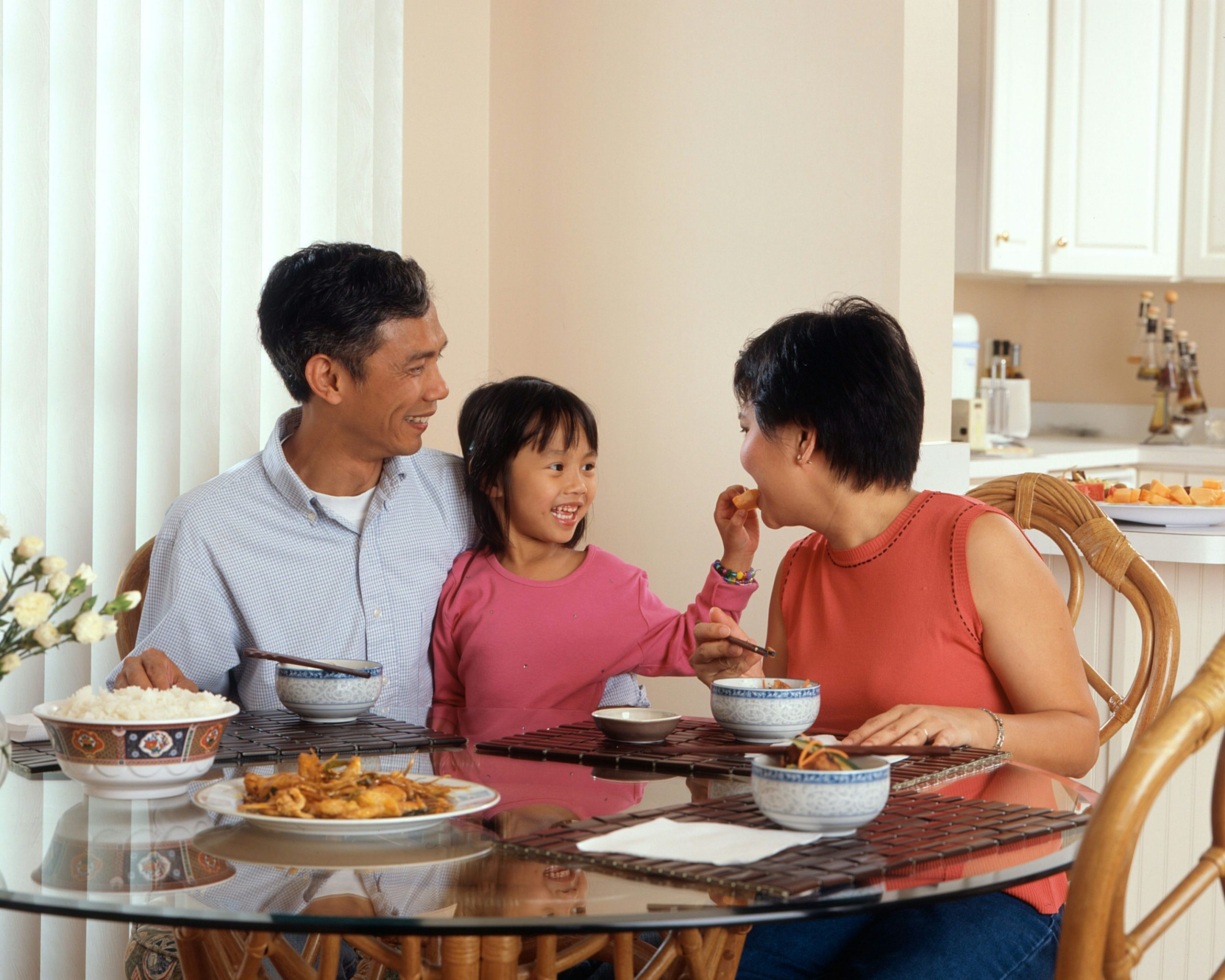 A family sharing a meal together at home.