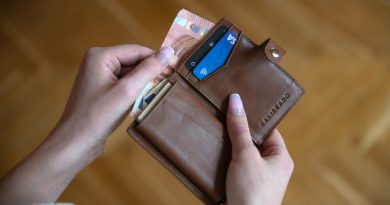 A brown leather wallet, representing a lost wallet containing an unexpected family connection.