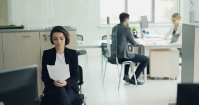 A job candidate waiting in an office before an interview.
