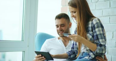 A couple reviewing information together, representing a conversation about shared finances.