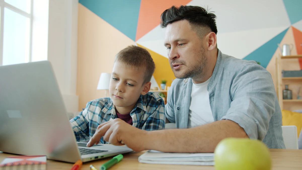 A father sitting with his child while helping with schoolwork.