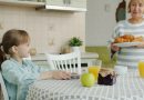 An elderly grandmother at home, representing a family discussion about memory, independence, and care.
