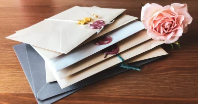 A greeting card and envelope resting on a table.