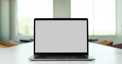 A laptop displaying an online job listing in an office.