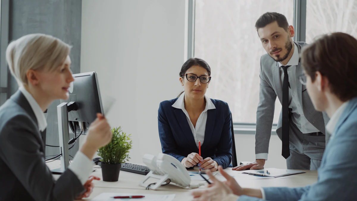An employee and manager having a serious conversation in an office.