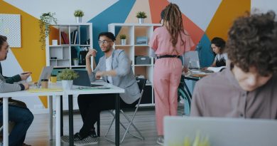 A modern office workspace, representing a desk reassignment and workplace communication problem.