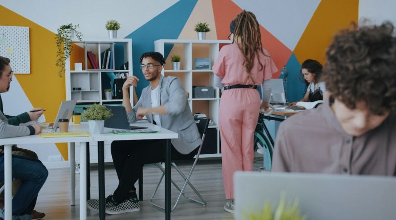 A modern office workspace, representing a desk reassignment and workplace communication problem.