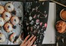 An old recipe book in a kitchen setting.