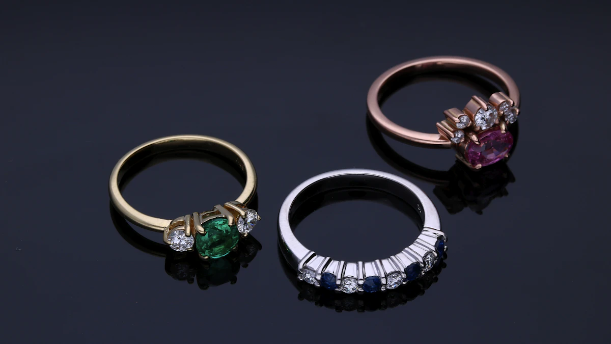 Several rings displayed for sale at a jewelry counter.