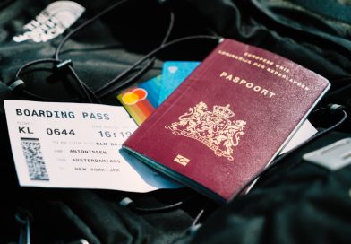 Passport and travel documents prepared for an international trip.