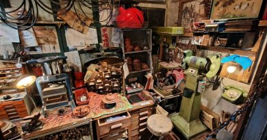 An old workshop with tools, representing a hidden phone discovered among a father's belongings.